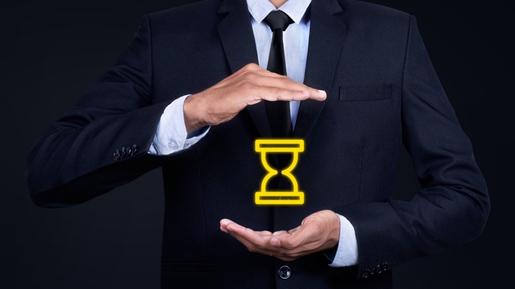 A man in a suit working with time to show the importance of tracking your hours at work by drafting billable time entries.