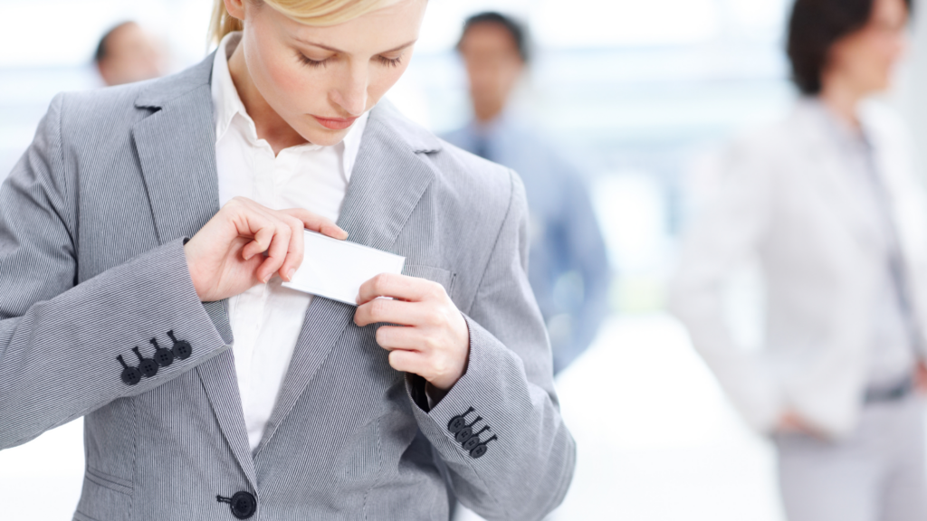 A paralegal places a piece of paper in her pocket to learn what to avoid in order not to lose her job.
