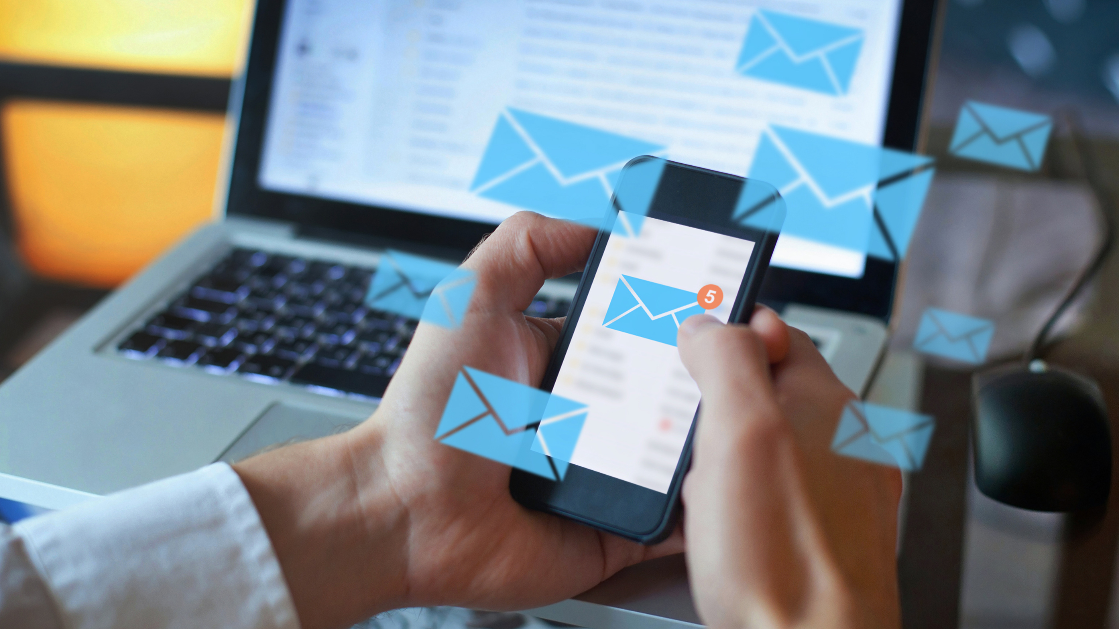 A paralegal checking email messages notifications on his phone to see the volume of email jam he has to deal with.