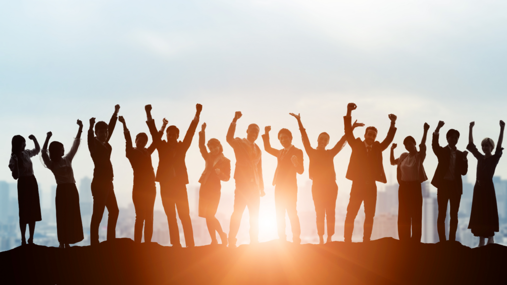 A silhouette of a litigation paralegal group jubilating about their success through the litigation paralegal's tips for success.