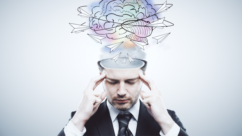 An image of paralegal placing his fingers beside his head to activate his Mind-reading skills as a paralegal.