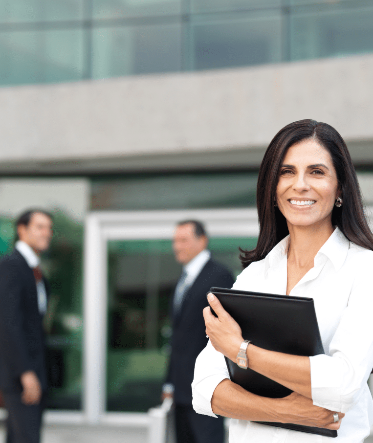 A professional paralegal holding a black document holder in preparation for the trial prep paralegal bootcamp.